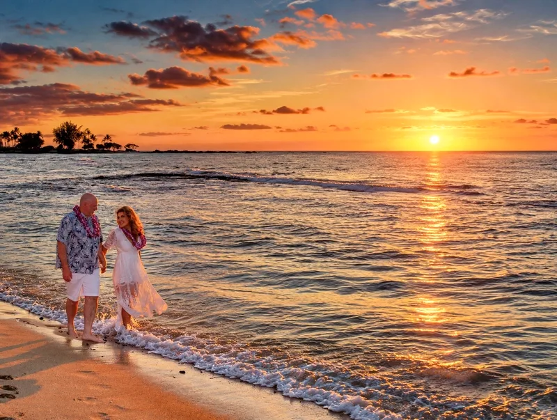 Todd and Gladys Juenger, marrying in Kuki'o Beach in Kona, Hawai'i